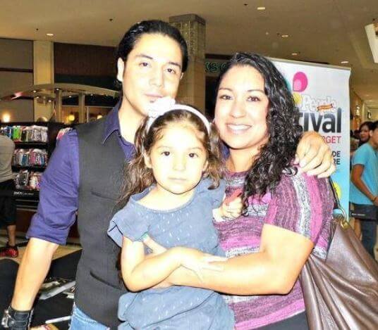 Cassie Perez with her parents, Chris Perez and Venessa Villanueva.